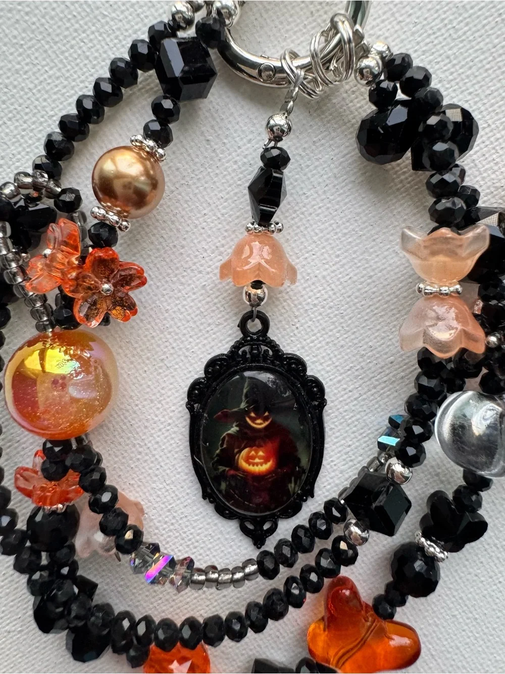 Handcrafted Black and Orange Beaded Halloween Phone Charm